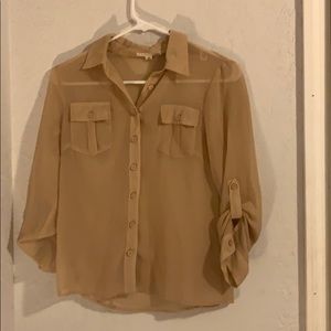 Buttoned up long sleeve sheer blouse